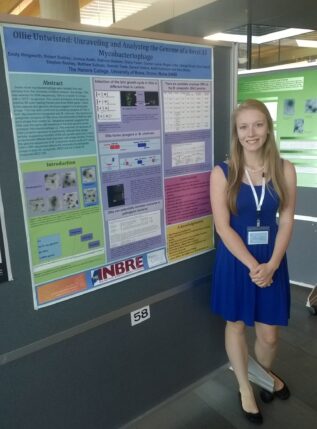 Emily Illingworth '17H stands with her poster at the 2014 SEA Phages Symposium in Virginia