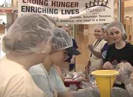 Honors students shown preparing for the Maine Day Meal Packout in 2019