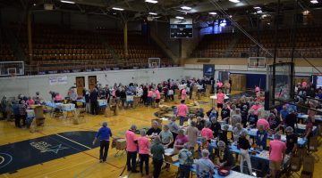 An overhead view of all the participants working in the 2019 Maine Day Meal Packout