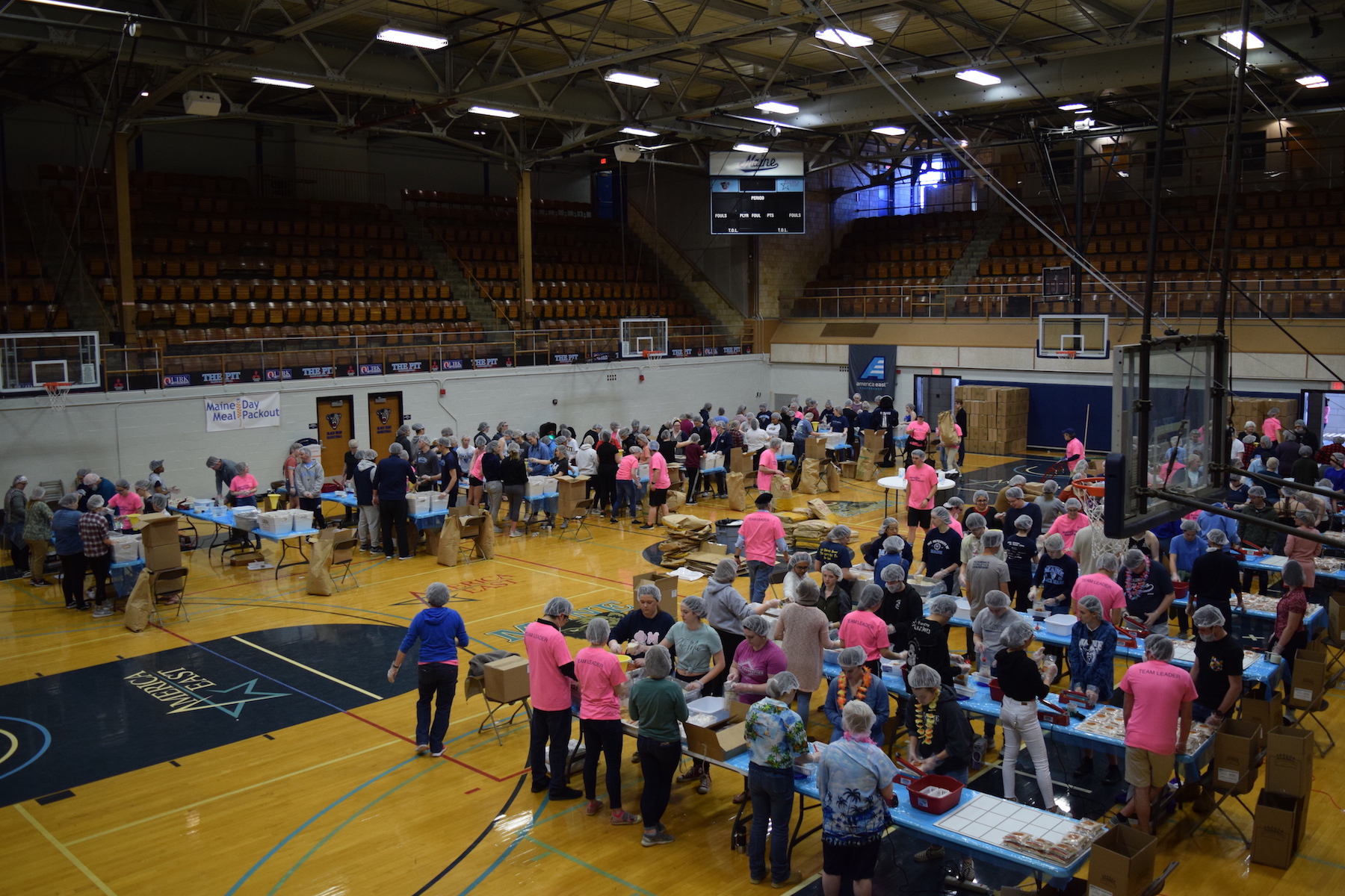 An overhead view of all the participants working in the 2019 Maine Day Meal Packout