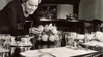 Margaret Chase Smith is shown setting a table