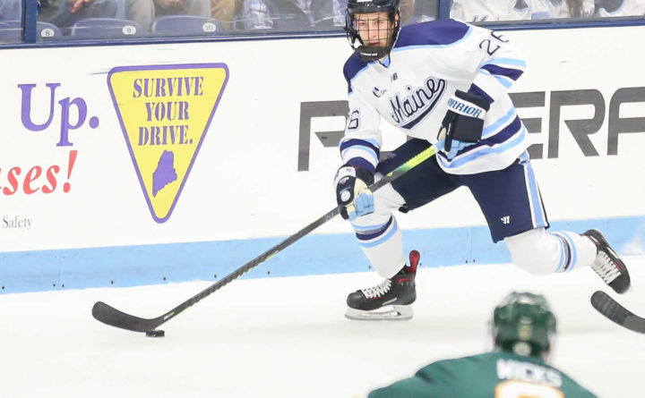 Cam Spicer plays ice hockey against Alaska Anchorage in an October 2019 game.