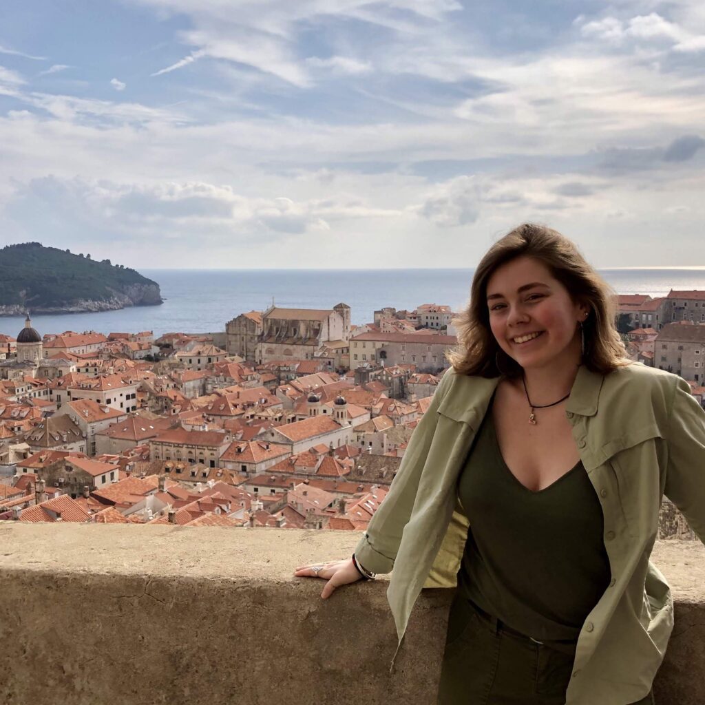 Honors student shown overlooking a city in Croatia while studying abroad.