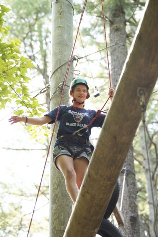 honors student on ropes course