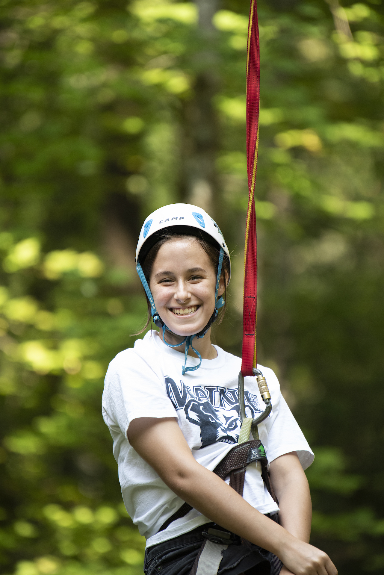 a student on a zipline