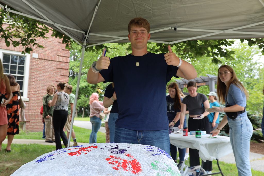 A student giving two thumbs up