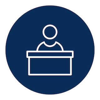 An icon of someone standing in front of a podium